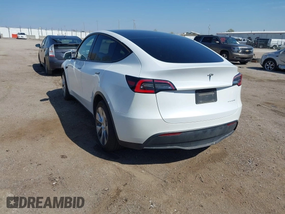 2021 Tesla Model Y Long Range with VIN 5YJYGDEE4MF122362, listed as a IAAI auction lot 42096138 with 47,006 mi miles and . Bid and sale history available at DreamBid. Image 3.