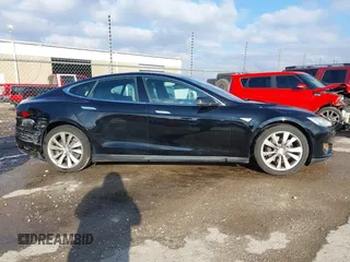 2016 Tesla Model S 70 with VIN 5YJSA1E11GF124965, listed as a IAAI auction lot 41458132 with Not provided miles and . Bid and sale history available at DreamBid. Image 13.
