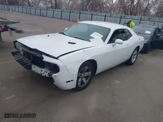 2014 Dodge Challenger SXT with VIN 2C3CDYAG8EH126884, listed as a IAAI auction lot 41423275 with 334,497 mi miles. Bid and sale history available at carsss.com. Image 2.