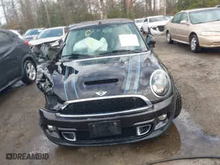 2013 MINI Cooper Convertible S with VIN WMWZP3C54DT297304, listed as a IAAI auction lot 41377572 with 101,991 mi miles. Bid and sale history available at carsss.com. Image 12.