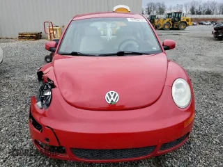 2009 Volkswagen New Beetle Coupe S with VIN 3VWPW31C79M502390, listed as a Copart auction lot 42453195 with 57,140 mi miles and Salvage Title. Bid and sale history available at carsss.com. Image 5.