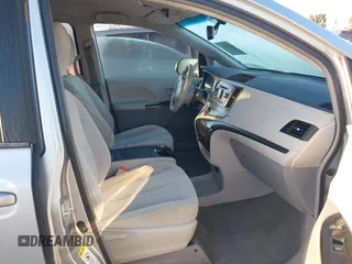 2014 Toyota Sienna LE AAS with VIN 5TDKK3DC1ES520561, listed as a IAAI auction lot 41959565 with 115,908 mi miles and . Bid and sale history available at carsss.com. Image 5.