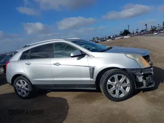 2014 Cadillac SRX Performance Collection with VIN 3GYFNCE39ES544135, listed as a IAAI auction lot 41808644 with 145,772 mi miles and . Bid and sale history available at carsss.com. Image 14.