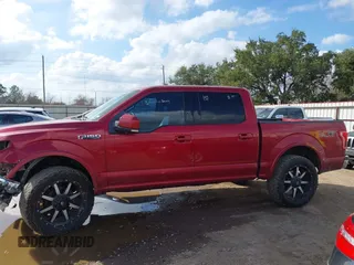 2015 Ford F-150 XLT with VIN 1FTEW1EF0FKD54685, listed as a IAAI auction lot 41503322 with 130,708 mi miles and . Bid and sale history available at DreamBid. Image 14.