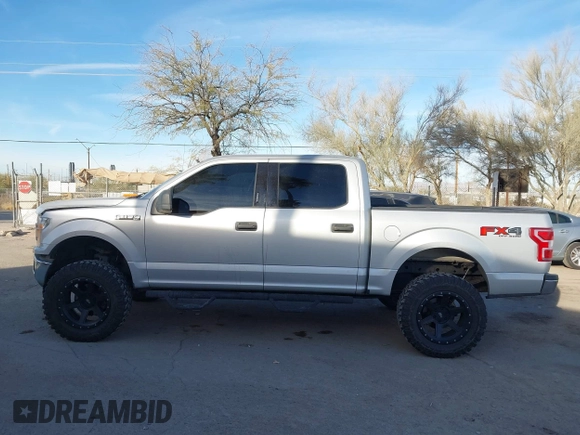 2019 Ford F-150 XL with VIN 1FTEW1E43KKE23264, listed as a IAAI auction lot 41395865 with 106,898 mi miles. Bid and sale history available at carsss.com. Image 14.