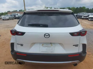 2024 Mazda CX-50 Premium z VIN 7MMVABDY8RN209081, wystawiony jako IAAI lot #42009149 z przebiegiem 18 369 mil mil oraz . Historia ofert i sprzedaży dostępna na DreamBid. Obrazek 16.