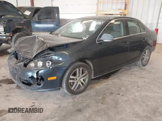 2006 Volkswagen Jetta 1.9L TDI z VIN 3VWDT71K26M624953, wystawiony jako IAAI lot #42420386 z przebiegiem 161 686 mil mil oraz . Historia ofert i sprzedaży dostępna na DreamBid. Obrazek 17.
