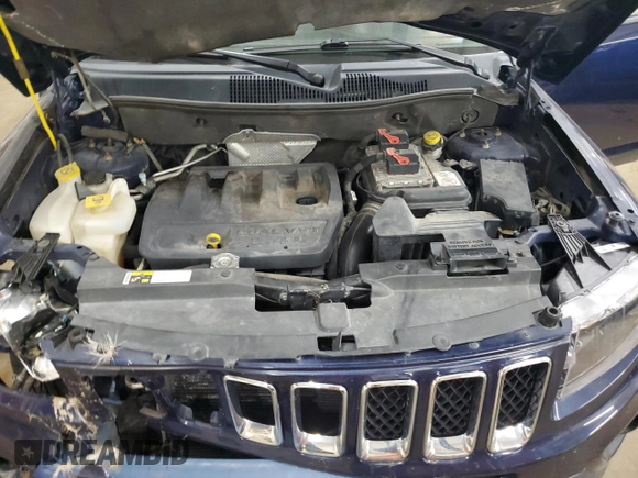 2014 Jeep Compass Sport with VIN 1C4NJDBB0ED598518, listed as a Copart auction lot 55072665 with 128,141 mi miles and Salvage Title. Bid and sale history available at carsss.com. Image 12.