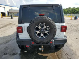 2019 Jeep Wrangler Unlimited Rubicon with VIN 1C4HJXFGXKW613269, listed as a Copart auction lot 62428605 with 56,270 mi miles and Salvage title. Bid and sale history available at DreamBid. Image 6.