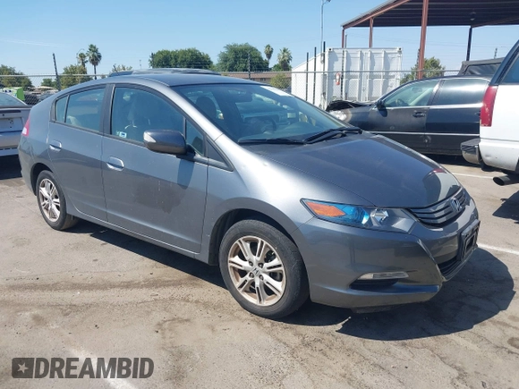 2010 Honda Insight EX with VIN JHMZE2H72AS015870, listed as a IAAI auction lot 42762384 with 58,121 mi miles and . Bid and sale history available at DreamBid. Image 1.