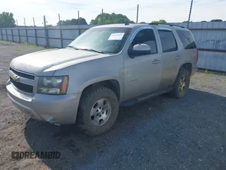 2007 Chevrolet Tahoe LT with VIN 1GNFK13087R165703, listed as a IAAI auction lot 42370222 with 150,014 mi miles and . Bid and sale history available at DreamBid. Image 2.