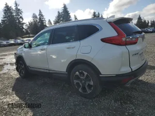2018 Honda CR-V Touring with VIN 2HKRW2H90JH689742, listed as a Copart auction lot 51347445 with 35,333 mi miles and Salvage Title. Bid and sale history available at DreamBid. Image 2.