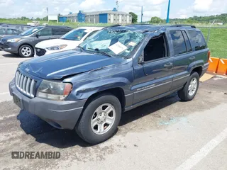 2004 Jeep Grand Cherokee Laredo with VIN 1J4GX48S44C205469, listed as a IAAI auction lot 42310571 with 154,929 mi miles and . Bid and sale history available at DreamBid. Image 2.