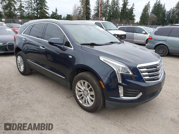 2017 Cadillac XT5 FWD with VIN 1GYKNARS2HZ188557, listed as a IAAI auction lot 41840764 with 104,524 mi miles. Bid and sale history available at carsss.com. Image 1.