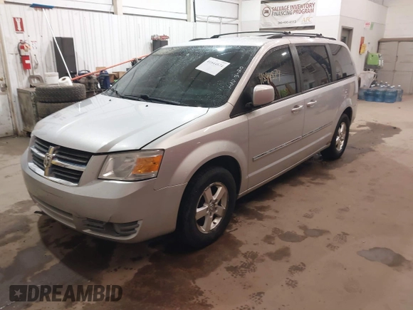 2008 Dodge Grand Caravan SXT with VIN 1D8HN54P18B129536, listed as a IAAI auction lot 41844874 with 260,000 mi miles and . Bid and sale history available at DreamBid. Image 17.