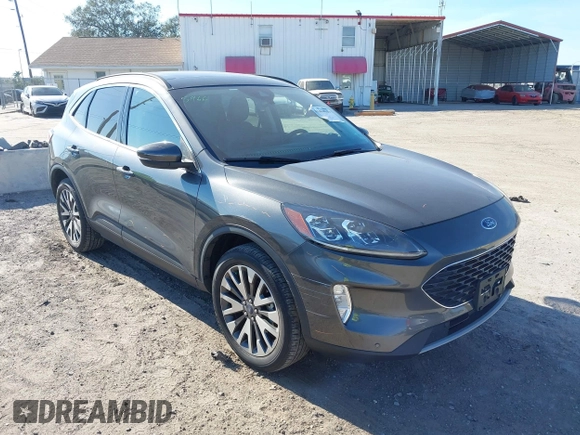 2020 Ford Escape Titanium with VIN 1FMCU9J9XLUA66440, listed as a IAAI auction lot 41464049 with 57,626 mi miles and . Bid and sale history available at DreamBid. Image 1.