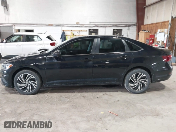 2021 Volkswagen Jetta SEL with VIN 3VWE57BU0MM093120, listed as a IAAI auction lot 42028835 with 39,986 mi miles and . Bid and sale history available at DreamBid. Image 14.