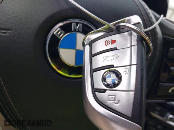 2019 BMW 5 Series 530i xDrive with VIN WBAJA7C51KG912614, listed as a IAAI auction lot 41516131 with 91,022 mi miles and . Bid and sale history available at DreamBid. Image 11.