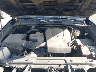 2016 Toyota Tacoma SR5 with VIN 5TFDZ5BN7GX001869, listed as a IAAI auction lot 40610002 with 184,380 mi miles. Bid and sale history available at carsss.com. Image 10.