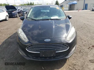 2016 Ford Fiesta SE z VIN 3FADP4EJ3GM155158, wystawiony jako Copart lot #55883465 z przebiegiem 116 184 mil mil oraz Czysty tytuł • Clean title. Historia ofert i sprzedaży dostępna na DreamBid. Obrazek 5.