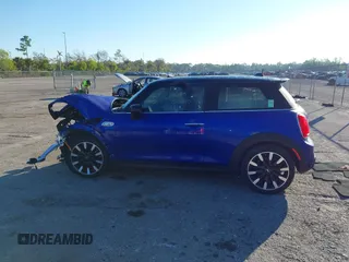 2020 MINI Hardtop Cooper S z VIN WMWXR5C09L2M32640, wystawiony jako IAAI lot #41463311 z przebiegiem 62 050 mil mil oraz . Historia ofert i sprzedaży dostępna na DreamBid. Obrazek 13.
