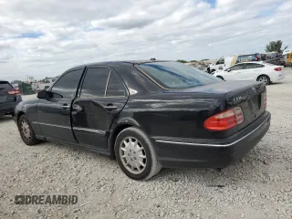 2001 Mercedes-Benz E-Class with VIN WDBJF70J51B372314, listed as a Copart auction lot 81494124 with 180,736 mi miles and Salvage Title. Bid and sale history available at carsss.com. Image 2.