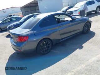 2014 BMW 2 Series M235i with VIN WBA1J7C51EVX33702, listed as a IAAI auction lot 41713337 with 83,076 mi miles. Bid and sale history available at carsss.com. Image 4.