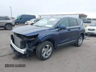 2023 Hyundai Santa Fe SE z VIN 5NMS1DAJ2PH555126, wystawiony jako IAAI lot #41992424 z przebiegiem 34 263 mil mil oraz . Historia ofert i sprzedaży dostępna na DreamBid. Obrazek 18.