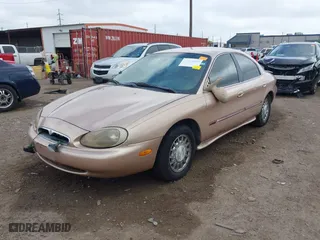 1997 Mercury Sable LS with VIN 1MELM53S8VA602057, listed as a IAAI auction lot 41468005 with 71,203 mi miles. Bid and sale history available at carsss.com. Image 17.