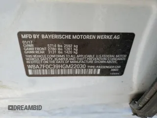 2017 BMW 7 Series 750i with VIN WBA7F0C39HGM22030, listed as a Copart auction lot 87127484 with 110,634 mi miles and Salvage title. Bid and sale history available at DreamBid. Image 12.