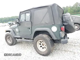 2003 Jeep Wrangler Sport with VIN 1J4FA49S03P330858, listed as a Copart auction lot 59519085 with Not provided miles and Salvage title. Bid and sale history available at DreamBid. Image 2.