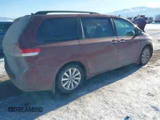 2014 Toyota Sienna XLE with VIN 5TDYK3DC5ES425818, listed as a IAAI auction lot 41421282 with 105,586 mi miles and . Bid and sale history available at DreamBid. Image 4.
