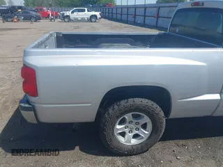 2005 Dodge Dakota SLT with VIN 1D7HE42K95S337682, listed as a IAAI auction lot 41905755 with 145,095 mi miles and . Bid and sale history available at carsss.com. Image 13.