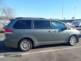 2011 Toyota Sienna XLE AAS with VIN 5TDYK3DC4BS072693, listed as a IAAI auction lot 41579262 with 146,201 mi miles. Bid and sale history available at carsss.com. Image 13.