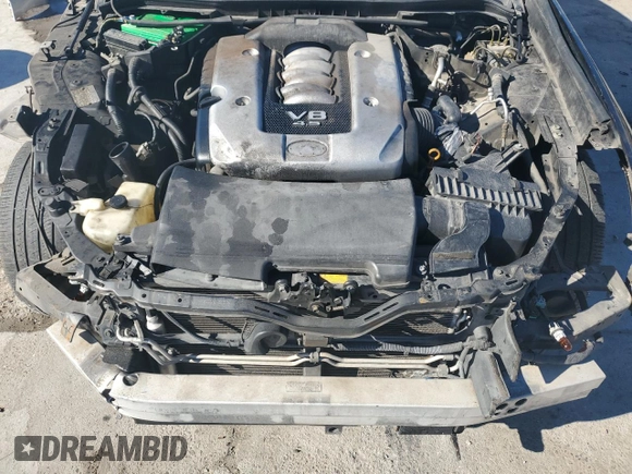 2006 Infiniti M Sport z VIN JNKBY01E56M203302, wystawiony jako Copart lot #85528514 z przebiegiem 199 489 mil mil oraz Szkoda całkowita • Salvage title. Historia ofert i sprzedaży dostępna na DreamBid. Obrazek 11.
