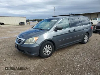 2010 Honda Odyssey EX-L with VIN 5FNRL3H72AB055070, listed as a Copart auction lot 80328974 with 221,467 mi miles and Salvage Title. Bid and sale history available at DreamBid. Image 1.