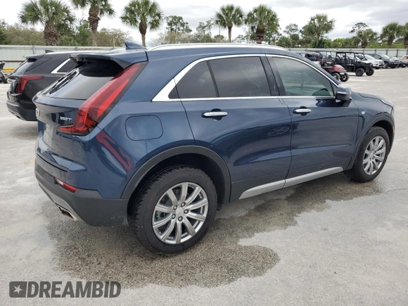 2021 Cadillac XT4 FWD Premium Luxury z VIN 1GYFZCR48MF056210, wystawiony jako Copart lot #45818245 z przebiegiem Nie podano mil oraz Nie do naprawy • Non repairable. Historia ofert i sprzedaży dostępna na DreamBid. Obrazek 3.