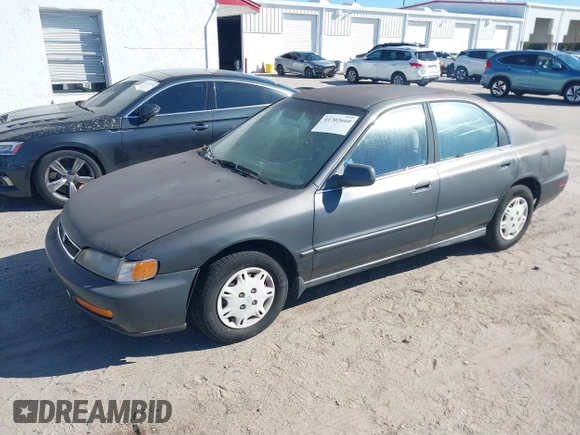 1997 Honda Accord Value with VIN 1HGCD5689VA182425, listed as a IAAI auction lot 41702660 with 208,005 mi miles and . Bid and sale history available at carsss.com. Image 2.