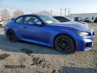 2025 BMW M2 with VIN 3MF23DM03S8E95026, listed as a Copart auction lot 42879435 with 6,399 mi miles and Salvage Title. Bid and sale history available at carsss.com. Image 4.