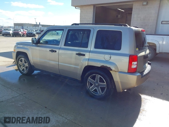2009 Jeep Patriot Sport with VIN 1J4FT28B59D195435, listed as a IAAI auction lot 40758450 with 130,728 mi miles. Bid and sale history available at carsss.com. Image 3.