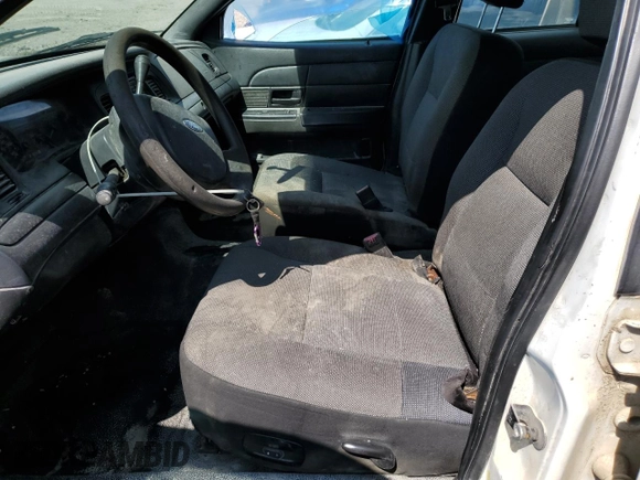 2007 Ford Police Interceptor z VIN 2FAFP71W57X156098, wystawiony jako Copart lot #62784325 z przebiegiem Nie podano mil oraz Szkoda całkowita • Salvage title. Historia ofert i sprzedaży dostępna na DreamBid. Obrazek 7.
