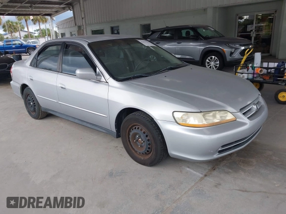 2001 Honda Accord LX with VIN 1HGCG55401A063548, listed as a IAAI auction lot 42651792 with 215,058 mi miles and . Bid and sale history available at DreamBid. Image 1.