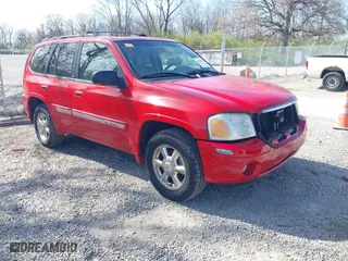 2002 GMC Envoy SLT with VIN 1GKDT13S322512505, listed as a IAAI auction lot 42056266 with 139,793 mi miles. Bid and sale history available at carsss.com. Image 1.