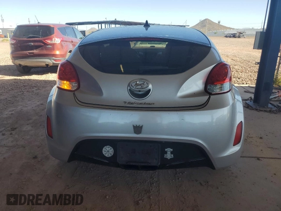 2014 Hyundai Veloster z VIN KMHTC6AD7EU216819, wystawiony jako Copart lot #57135335 z przebiegiem 104 588 mil mil oraz Szkoda całkowita • Salvage title. Historia ofert i sprzedaży dostępna na DreamBid. Obrazek 6.