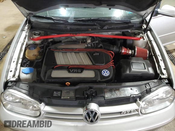 2001 Volkswagen GTI z VIN 9BWPG61J314064540, wystawiony jako Copart lot #57957945 z przebiegiem 130 262 mil mil oraz Szkoda całkowita • Salvage title. Historia ofert i sprzedaży dostępna na DreamBid. Obrazek 11.