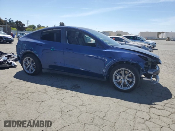 2024 Tesla Model Y Long Range z VIN 7SAYGAEE3RF034699, wystawiony jako Copart lot #54523815 z przebiegiem 9 764 mil mil oraz Szkoda całkowita • Salvage title. Historia ofert i sprzedaży dostępna na DreamBid. Obrazek 4.