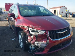 2021 Chrysler Pacifica Touring L z VIN 2C4RC1BG1MR542816, wystawiony jako IAAI lot #41757526 z przebiegiem 76 634 mil mil oraz . Historia ofert i sprzedaży dostępna na DreamBid. Obrazek 1.