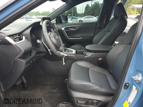 2023 Toyota RAV4 Hybrid XSE with VIN 2T3E6RFV6PW039337, listed as a Copart auction lot 58767635 with 19,126 mi miles and Salvage title. Bid and sale history available at DreamBid. Image 7.