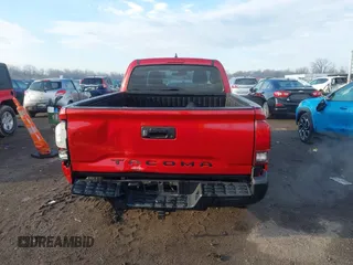 2018 Toyota Tacoma SR with VIN 5TFRX5GN5JX127708, listed as a IAAI auction lot 41654693 with 69,236 mi miles and . Bid and sale history available at DreamBid. Image 16.