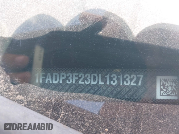 2013 Ford Focus SE with VIN 1FADP3F23DL131327, listed as a IAAI auction lot 42577474 with 146,412 mi miles and . Bid and sale history available at DreamBid. Image 9.